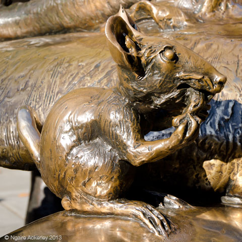 Mouse in Alice in Wonderland statue