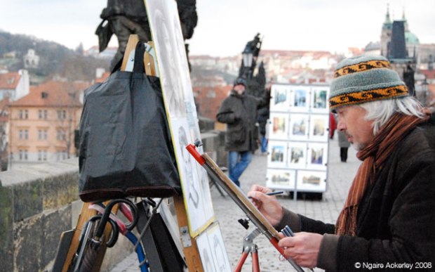 Artist on the Charles Bridge in Prague