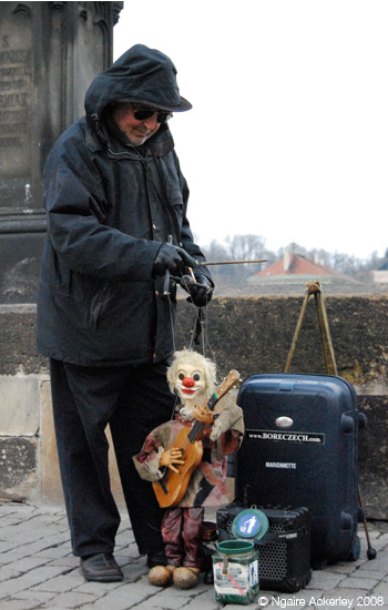Busker with a musical puppet, Prague, Czech Republic
