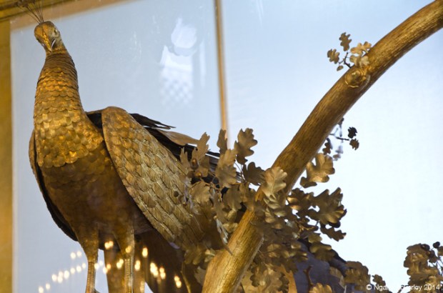 Peacock Clock that was interactive when it reaches a particular hour