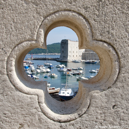 Peaking through a bridge to the port