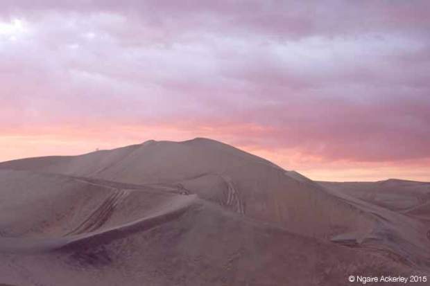 Huacachina sand dunes at sunset