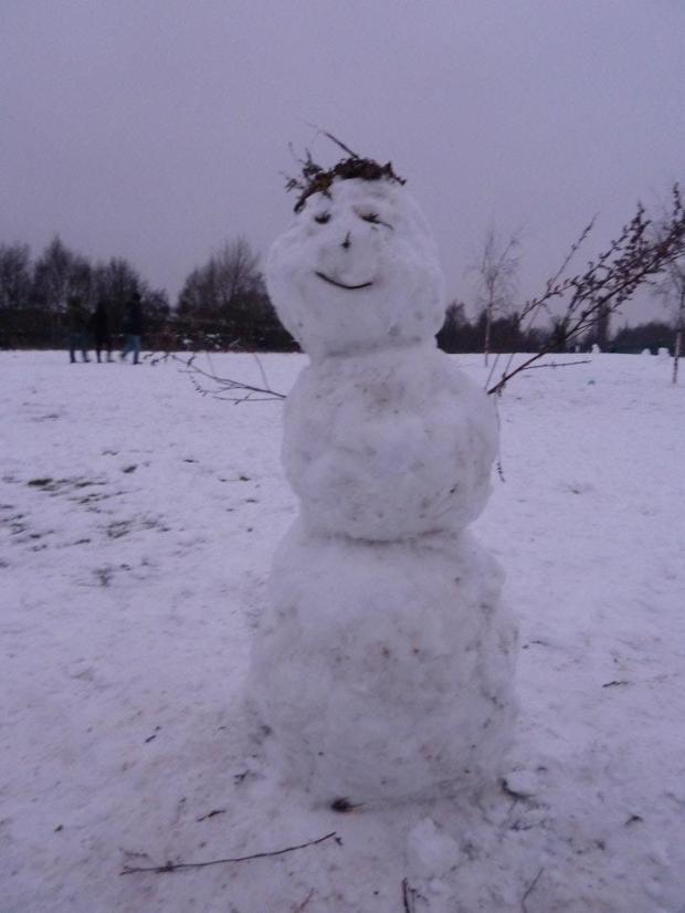 Snowman making in winter